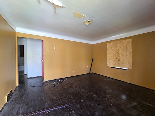 15876 Burt Rd, Detroit, MI 48223 - unfurnished room featuring hardwood / wood-style floors