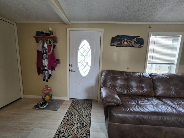 3867 Joseph St, Wellston, MI 49689 - foyer with a textured ceiling and baseboards