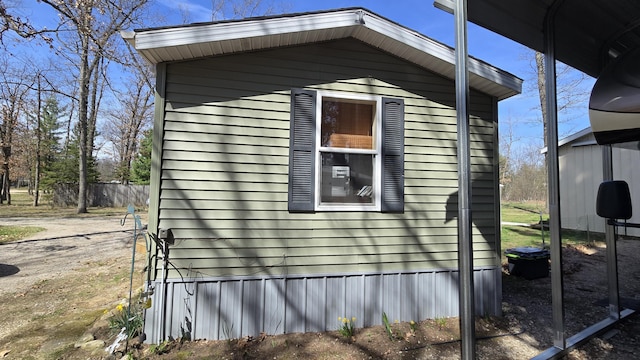 3867 Joseph St, Wellston, MI 49689 - view of side of home featuring an outdoor structure