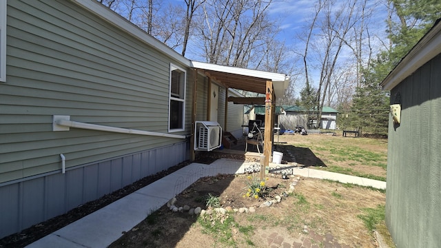 3867 Joseph St, Wellston, MI 49689 - view of yard featuring ac unit and a patio area