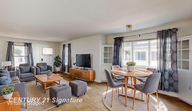 308 S Elm St, Saginaw, MI 48602 - living room with a wealth of natural light and light wood-type flooring