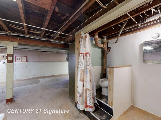 308 S Elm St, Saginaw, MI 48602 - unfinished below grade area featuring concrete block wall