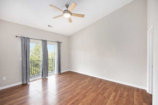 unfurnished room featuring visible vents, baseboards, a ceiling fan, and wood finished floors
