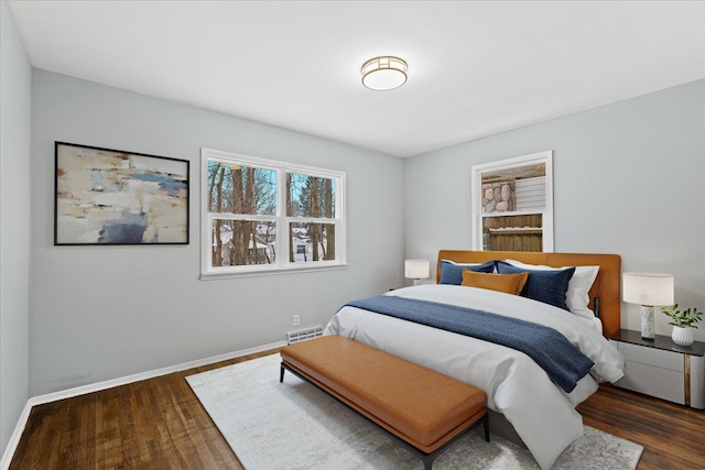 550 Royal Dr, Jackson, MI 49202 - bedroom featuring visible vents, baseboards, and wood finished floors