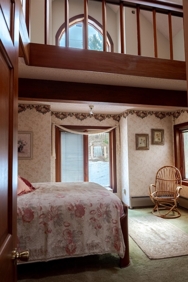 bedroom with high vaulted ceiling, multiple windows, wallpapered walls, and carpet flooring