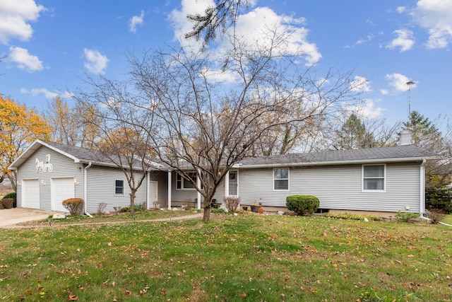 ranch-style house featuring an attached garage, a front lawn, and concrete driveway