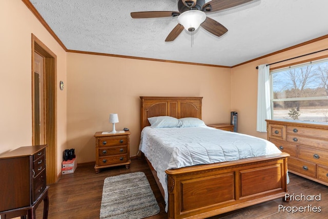 bedroom featuring ornamental molding, a textured ceiling, baseboards, ceiling fan, and dark wood-style flooring