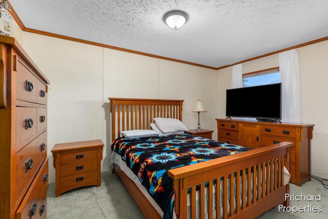 bedroom featuring light carpet, a textured ceiling, and ornamental molding