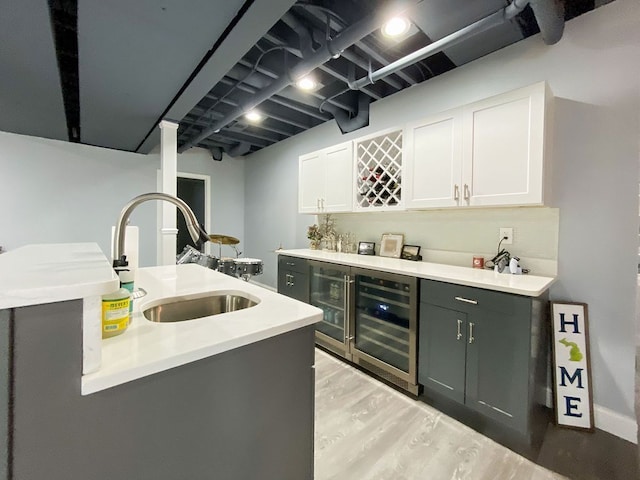 220 S Castell Ave, Rochester, MI 48307 - indoor bar featuring beverage cooler and light wood-type flooring