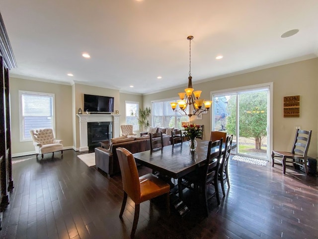 220 S Castell Ave, Rochester, MI 48307 - dining area featuring ornamental molding, healthy amount of natural light, a chandelier, dark wood finished floors, and recessed lighting
