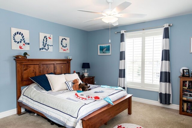 220 S Castell Ave, Rochester, MI 48307 - bedroom with light carpet, multiple windows, baseboards, and a ceiling fan