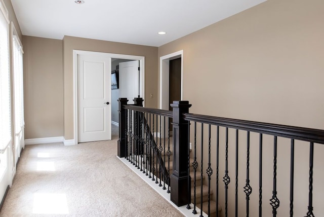 220 S Castell Ave, Rochester, MI 48307 - corridor with an upstairs landing, carpet, baseboards, and recessed lighting