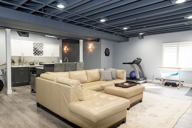 220 S Castell Ave, Rochester, MI 48307 - living area with wet bar and light wood finished floors