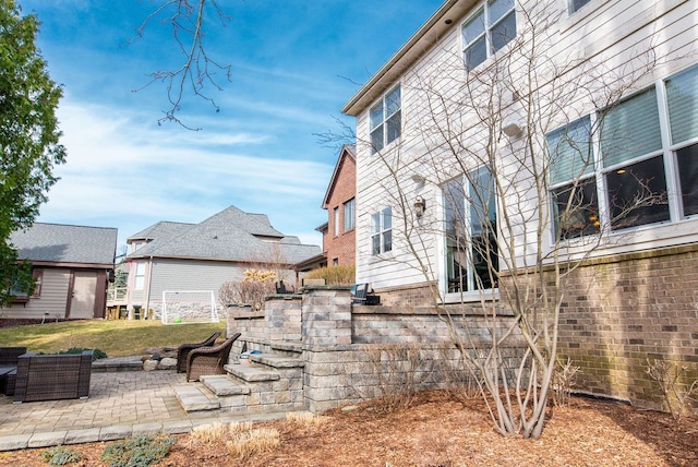220 S Castell Ave, Rochester, MI 48307 - view of home's exterior with a patio