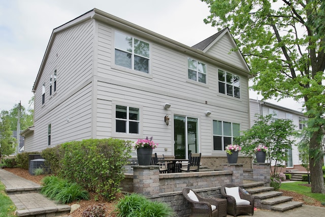 220 S Castell Ave, Rochester, MI 48307 - rear view of property featuring a patio area and central AC unit