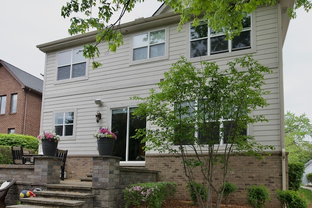 220 S Castell Ave, Rochester, MI 48307 - rear view of property with brick siding