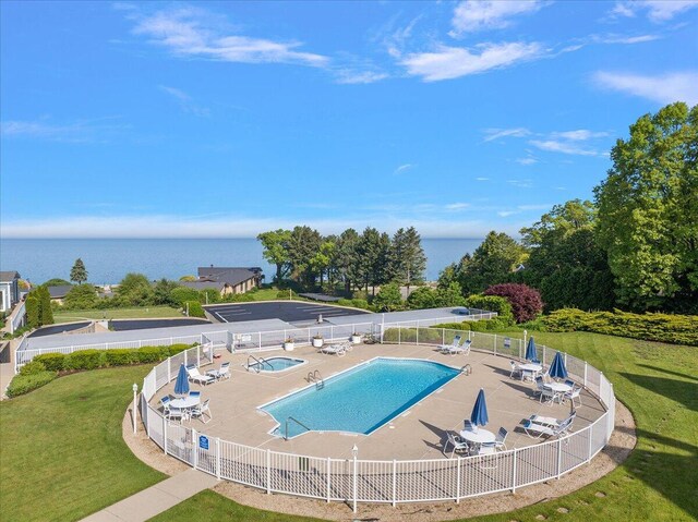 4144 Ridge Rd Unit 16, Stevensville, MI 49127 - community pool featuring a water view, a hot tub, and a patio