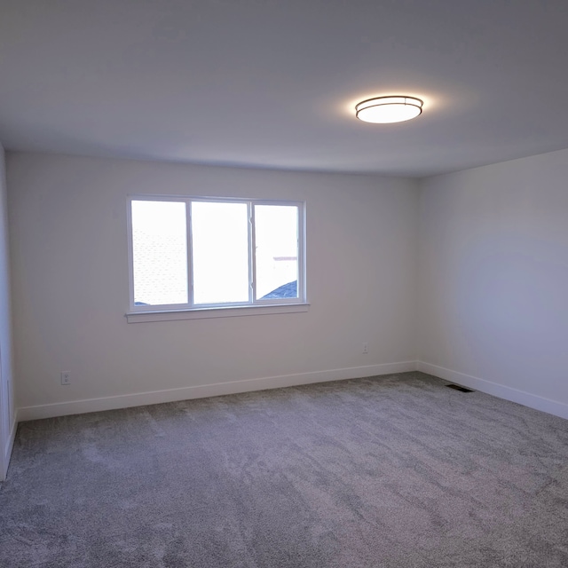 18430 Stallmann Dr, Macomb, MI 48042 - carpeted empty room featuring baseboards