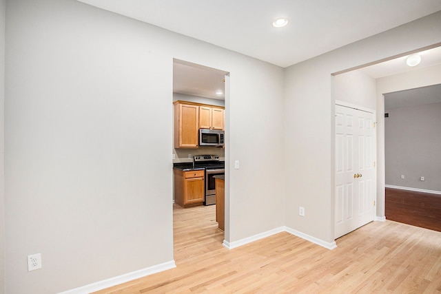 50128 Bethesda, Shelby Twp, MI 48317 - interior space featuring baseboards, light wood finished floors, and recessed lighting
