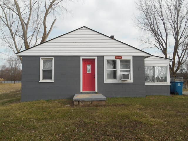 5972 Birch Run Rd, Millington, MI 48746 - bungalow featuring concrete block siding and a front lawn