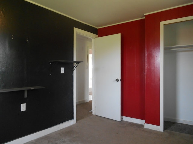5972 Birch Run Rd, Millington, MI 48746 - unfurnished bedroom with a closet, carpet, baseboards, and crown molding