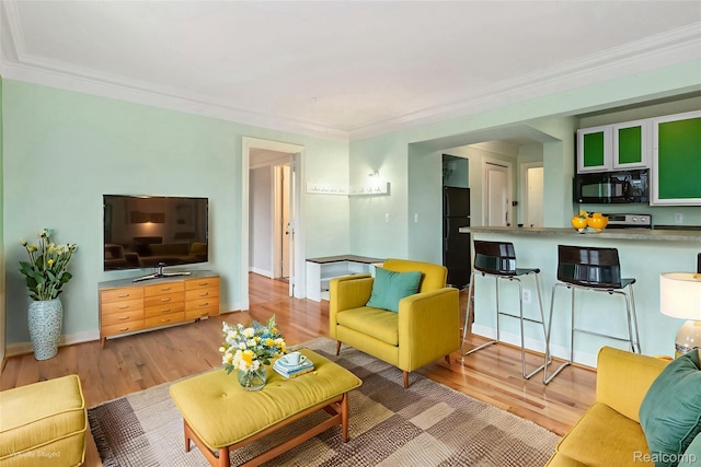 15 E Kirby St Unit 229, Detroit, MI 48202 - living area with light wood-style flooring, crown molding, and baseboards
