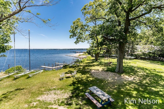 6195 Murray Rd, Whitehall, MI 49461 - property view of water featuring a dock