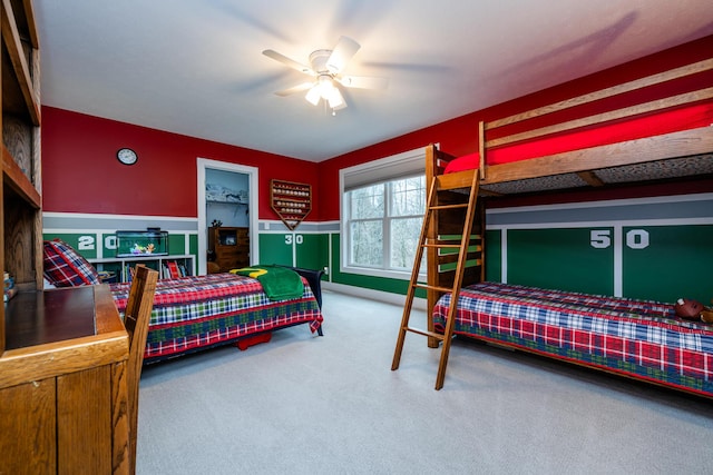 carpeted bedroom featuring a ceiling fan