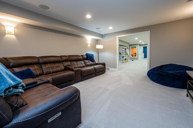 living room featuring recessed lighting, baseboards, carpet floors, and visible vents