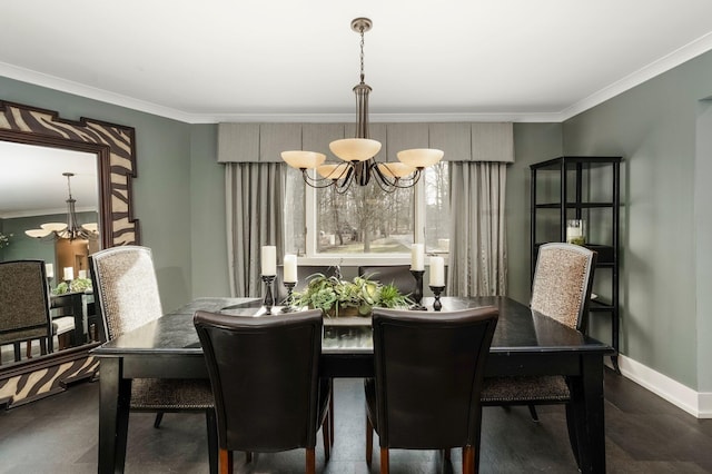 dining space with baseboards, a chandelier, and crown molding