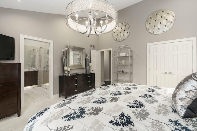 bedroom with a closet, visible vents, baseboards, light colored carpet, and a chandelier