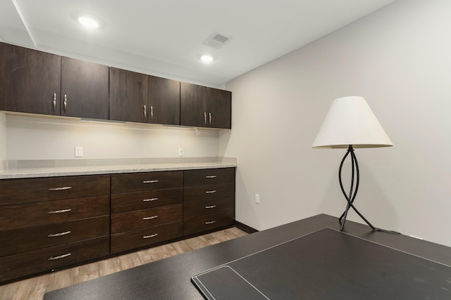 interior space with recessed lighting, visible vents, and light wood-type flooring