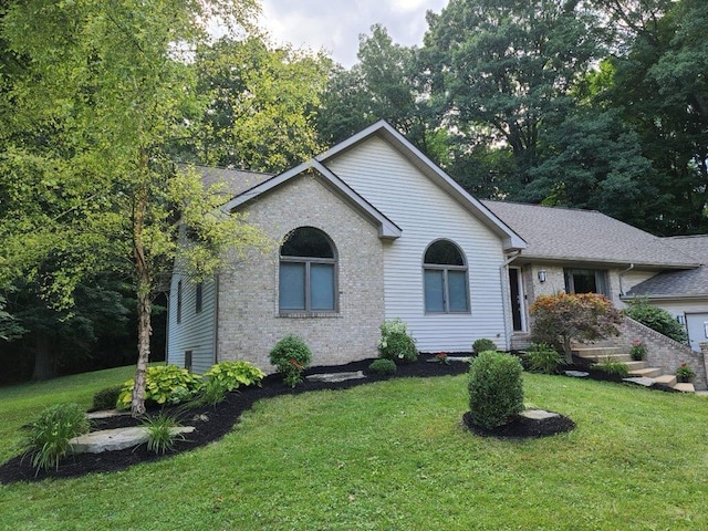 single story home featuring a front yard