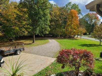 surrounding community with a yard