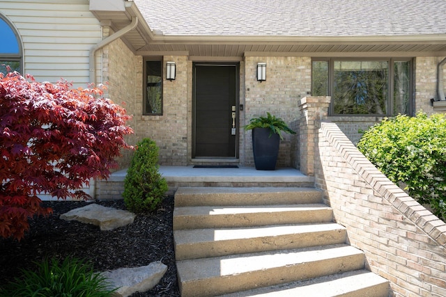 21395 Laser Ln, South Lyon, MI 48178 - doorway to property with roof with shingles
