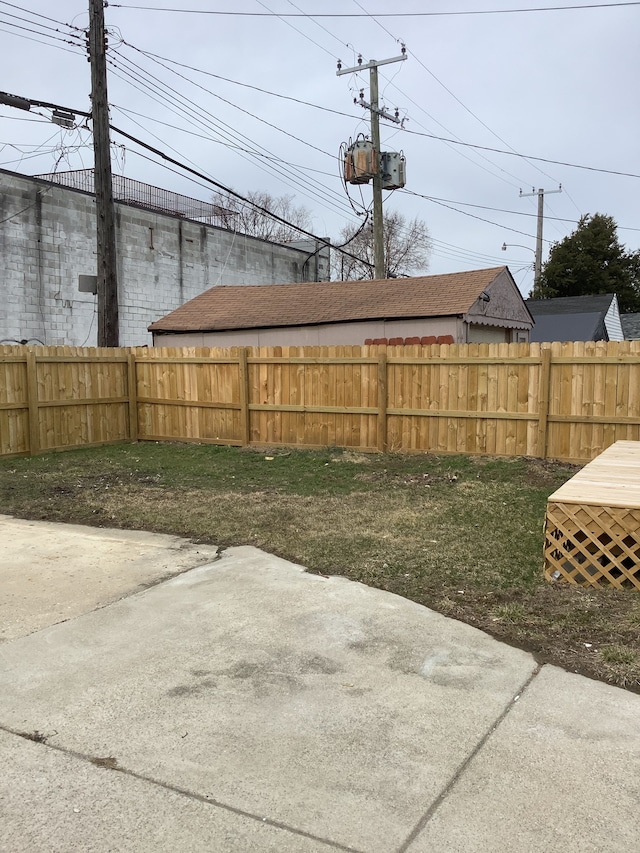 view of yard featuring a patio area and fence