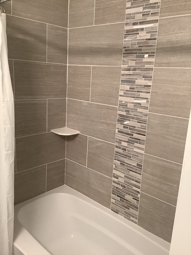 full bath featuring shower / tub combo