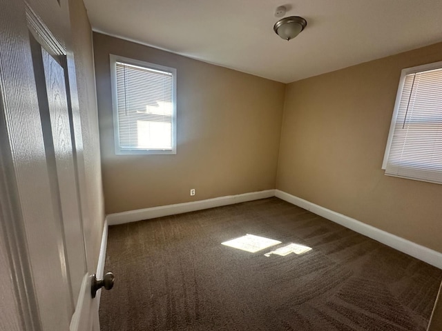 19980 Hickory St, Detroit, MI 48205 - carpeted empty room featuring baseboards and a smoke detector