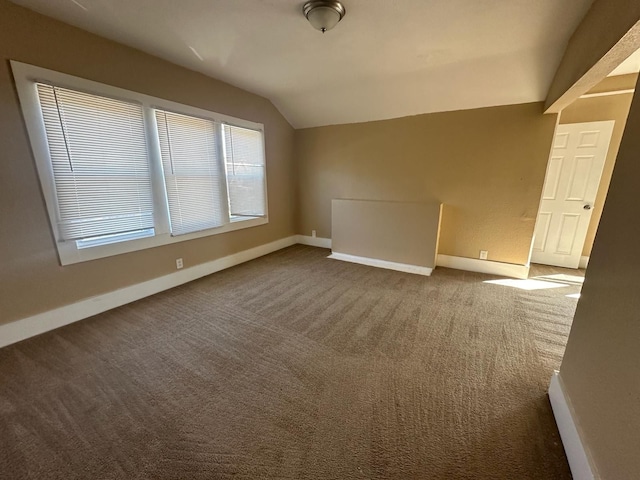 19980 Hickory St, Detroit, MI 48205 - empty room with vaulted ceiling and carpet flooring