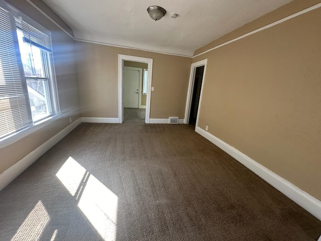 19980 Hickory St, Detroit, MI 48205 - empty room featuring carpet and baseboards