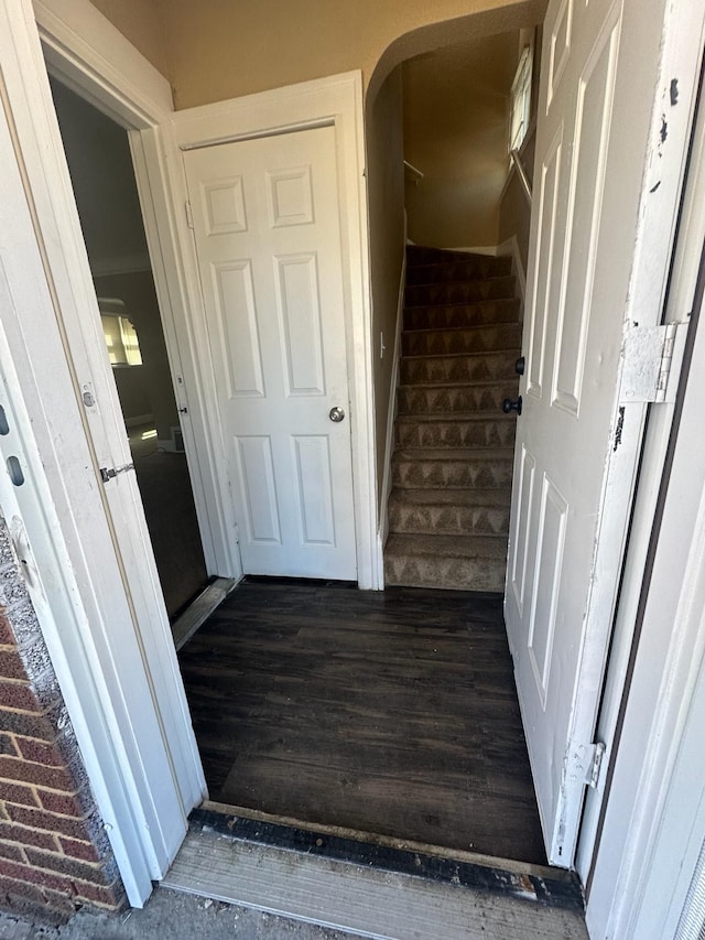 19980 Hickory St, Detroit, MI 48205 - staircase with wood finished floors and arched walkways
