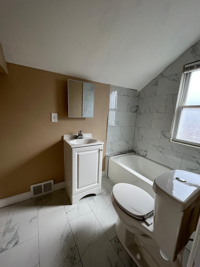 19980 Hickory St, Detroit, MI 48205 - bathroom with marble look tiles, vanity, and a tub