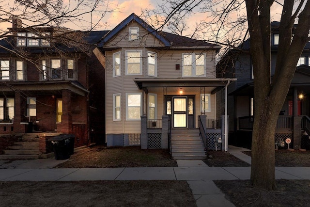 view of front of property featuring covered porch