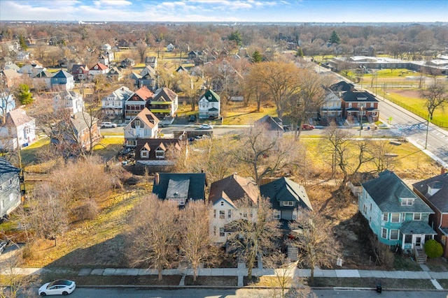 birds eye view of property with a residential view