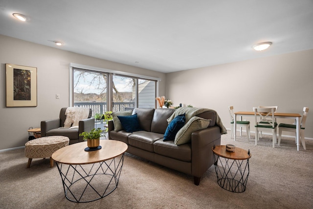living room with baseboards and carpet floors