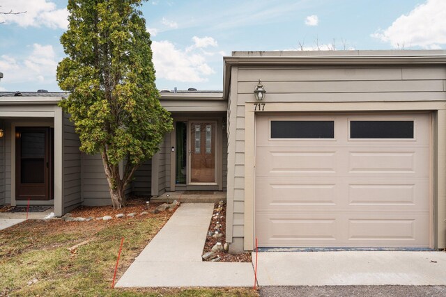 ranch-style house featuring a garage