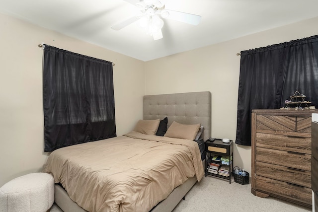 bedroom featuring carpet floors and a ceiling fan
