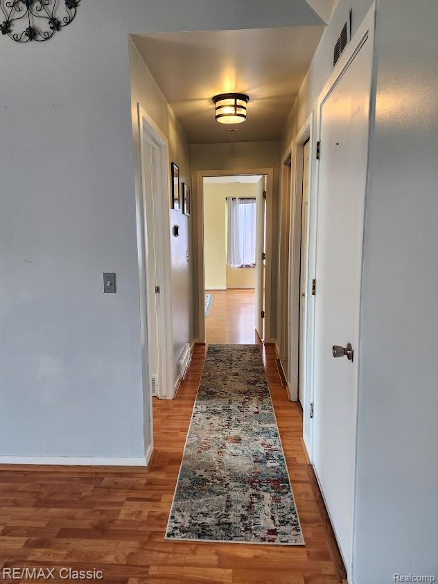 37512 Jefferson Ave Unit # 301, Harrison Township, MI 48045 - hall featuring light wood-type flooring and baseboards