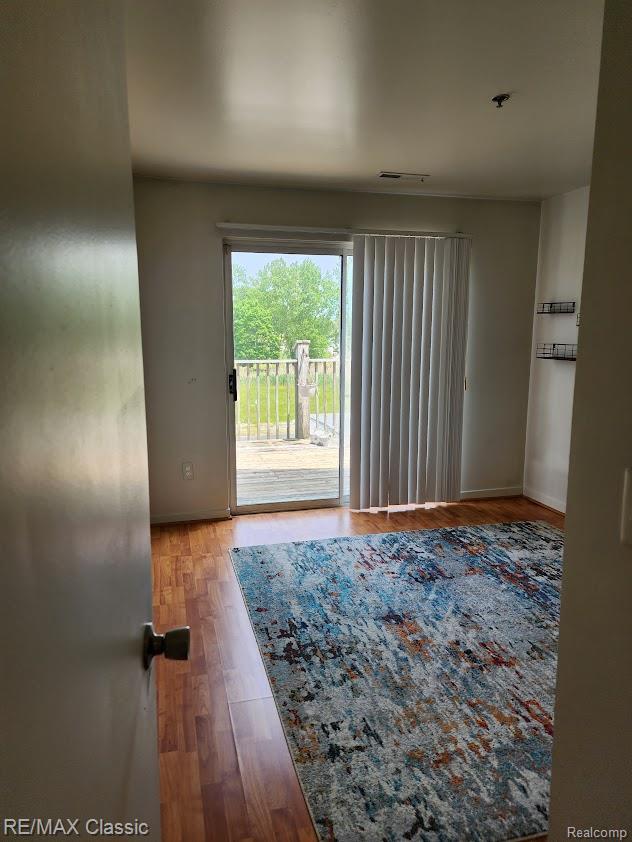 37512 Jefferson Ave Unit # 301, Harrison Township, MI 48045 - empty room featuring wood finished floors and baseboards