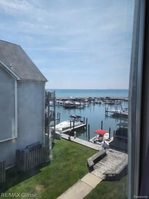 37512 Jefferson Ave Unit # 301, Harrison Township, MI 48045 - dock with a water view and a yard